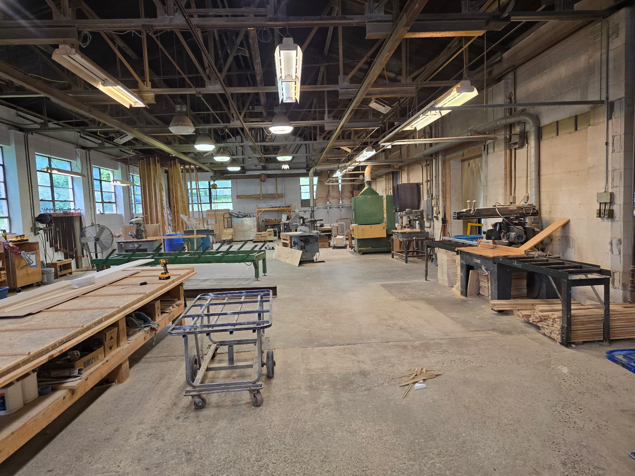 Snyder Stairs Whitehall, PA fabrication floor — saws, benches, and carts on the shop floor